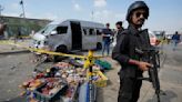 5 Japanese workers in Pakistan escape suicide blast targeting their van; Pakistani bystander dies