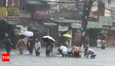 Taiwan prepares for a strong typhoon that worsened monsoon rains in the Philippines, killing 13 - Times of India