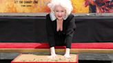 Cyndi Lauper cements hand and footprints at TCL Chinese Theatre