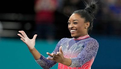 Simone Biles falls off beam then picks herself up to land floor silver medal at Paris 2024