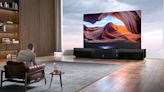 This New Ultra-Short-Throw 4K Laser Projector Has a Pop-Up Screen That Disappears When You’re Not Watching