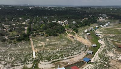 Floodgates open to distribute runoff water into Lake Travis from Lake LBJ, Llano River