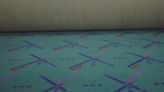Iconic PDX carpet makes triumphant return in new roll-out video