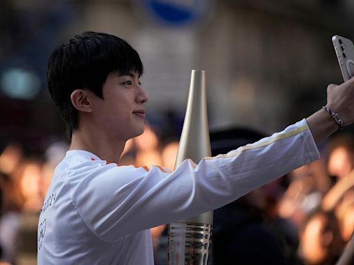 K-pop stars and athletes: Who carried the Olympic torch through Paris?