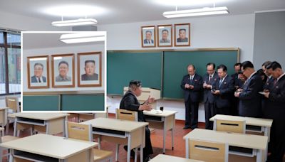 North Korea unveils Kim Jong Un portrait next to predecessors.