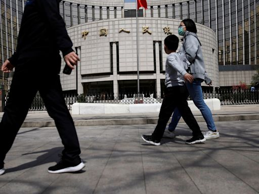 China cuts short and long-term rates