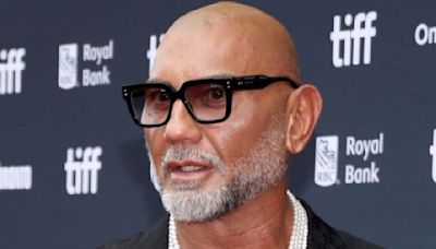 Batista muestra un cambio físico radical en la presentación de su última película