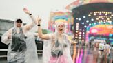 Fans dancing in the rain at Beyond Wonderland music festival