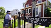 Postal workers are being attacked by dogs so much that they must avoid delivery in certain areas forcing people to pick up their own mail
