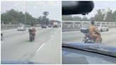 Malaysian man caught riding naked on a motorcycle after allegedly killing his wife and child