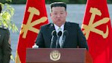 North Korean leader Kim doubles down on satellite ambitions following failed launch