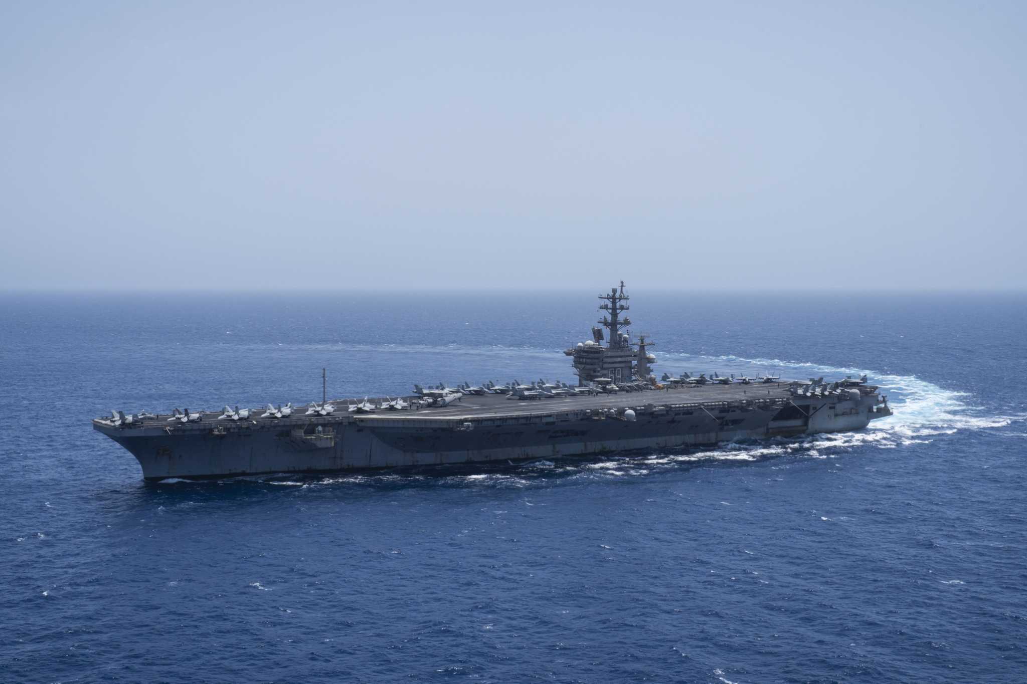 A US aircraft carrier and its crew have fought Houthi attacks for months. How long can it last?