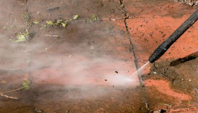 My patio was covered in black spots, but a 10p hack left it as good as new