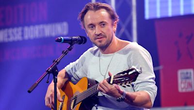 Tom Felton is filming a show about Gandhi, releasing new music