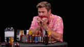 It looked harder for Chris Hemsworth to conquer Hot Ones than Mad Max