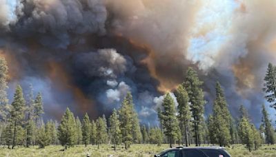 Wind-driven wildfire spreads near popular central Oregon vacation spot and prompts evacuations