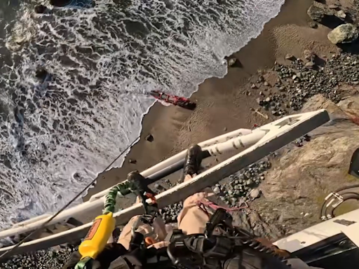 Unconscious man rescued from California beach as tide rolls in, dramatic video shows