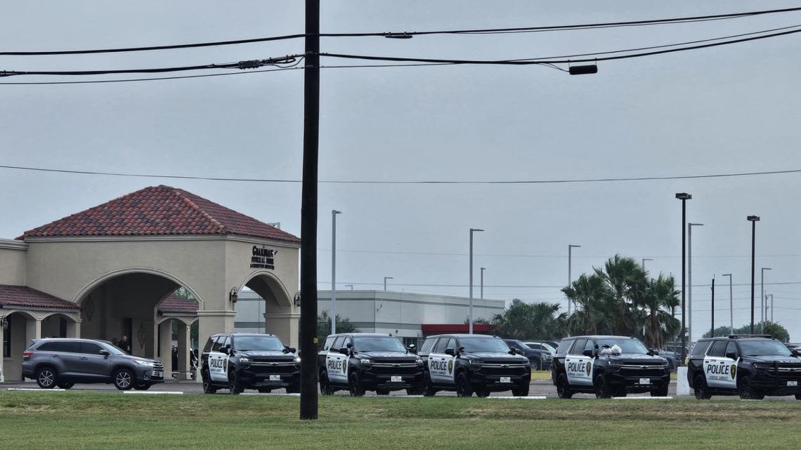 Police officers prepare for Kyle Hicks' Celebration of Life at Guardian Funeral Home