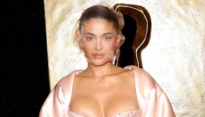 Kylie Jenner Turns Heads in Pink Bridal Face Net and Crystal-Dotted Corset Dress at Paris Fashion Week