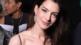 Anne Hathaway Looked Majorly Fierce in Head-to-Toe Sparkly Leopard Print During Paris Fashion Week