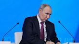 Putin urges restraint in state seizure of assets