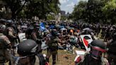 Dozens more arrested at UT-Austin as police use pepper spray, flash bangs to break up protests