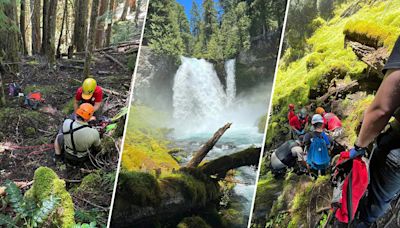 Hiker takes tumble off waterfall as crews use rope system to execute elaborate rescue