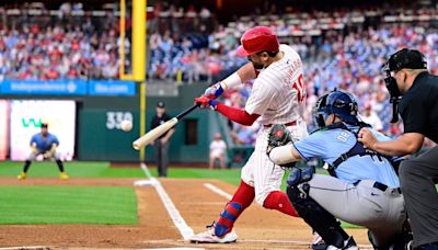 Phillies’ Kyle Schwarber hits record leadoff home run, leaves game with elbow injury