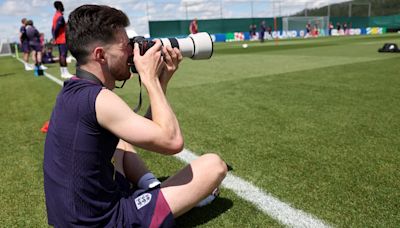 Declan Rice plays photographer during England training session