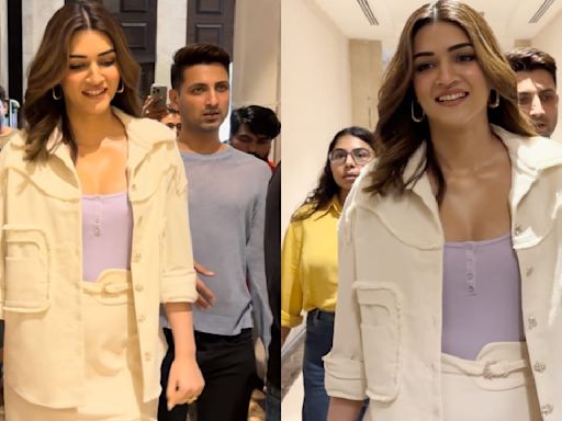 Kriti Sanon's crisp white jacket and asymmetric skirt ensemble is a flawless choice for formal meetings