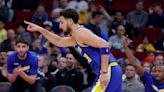 Thompson nets 10 3s, has 41 points in Warriors' 1st road win