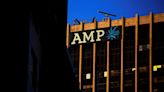 AMP Australian wealth management unit's net outflows more than halve