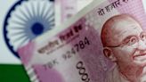 Rupee closes mildly weaker, forward premiums slip