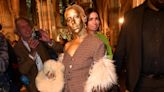 Doja Cat Hits Back at Critic for Calling Her Gold Paris Fashion Week Face Makeup 'Ugly'