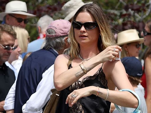 Behati Prinsloo dons black lace cami at Independence Day parade