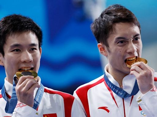 Chinese Olympic athletes 'don't see family for 3 years; train 12 hours a day'