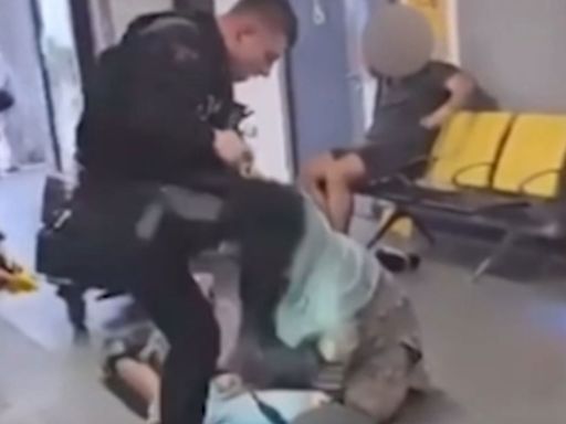 Police officer filmed stomping on man's head