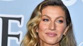 Gisele Bündchen looks completely unrecognisable with vampiric blood-red hair