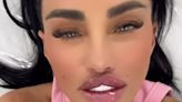 Katie Price shows off her 'bruised' new lips as she vows to have more bum filler