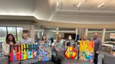 Hudson High School art students create art for company's headquarters