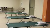 How has COVID-19 changed procedures at emergency shelters?