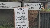 I covered my town’s potholed streets with hilarious signs - and now the council has agreed to fix them