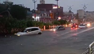 Heavy rains lash Rajasthan's Jaipur, vehicles seen submerged in water | Video