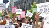 Columbia University professors demonstrate outside the campus demanding the release of students