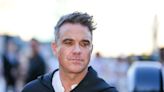 Robbie Williams trying to 'embrace' his hair loss: 'The pills depress me'