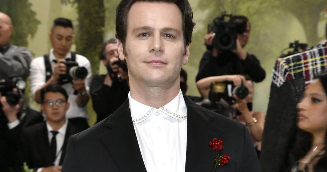 Jonathan Groff sports flower-adorned suit at 2024 Met Gala; Esquire and British GQ approve