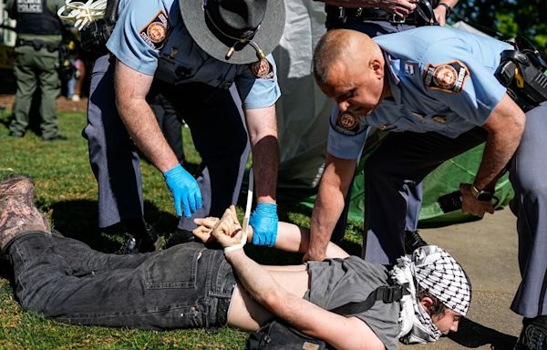 Emory faculty push for no-confidence vote of university president a day after tense protests