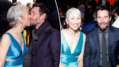 Keanu Reeves kisses Alexandra Grant with his eyes open – again – during rare red carpet date night