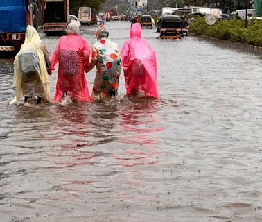 Four dead and flights cancelled as Mumbai gets flooding red alert after heavy rains