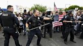 Protesters brawl as Southern California school district decides whether to recognize Pride Month